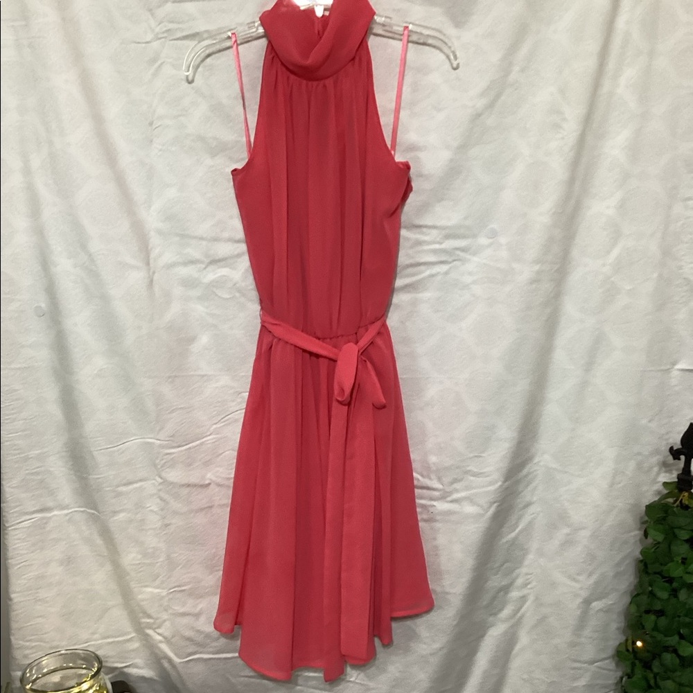 Beautiful Coral color dress. Worn twice. 3 buttons up the back of the neck!